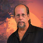 about-john-pitre Portrait of John Pitre, visionary artist known for surreal fine art exploring nature, energy, and human consciousness.
